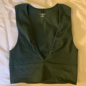 Green out from under bra top